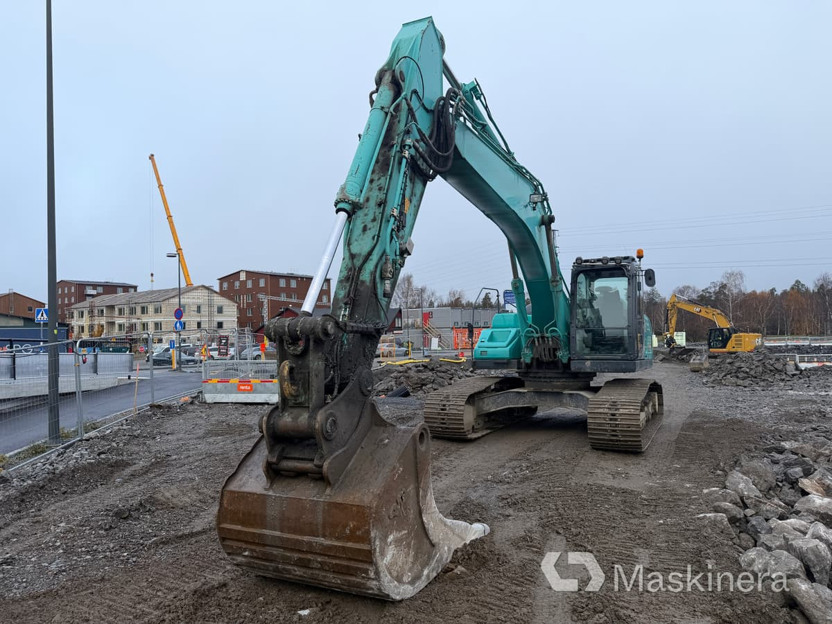 Grävmaskin Kobelco SK260LC-10 - Kettenbagger: das Bild 2 Grävmaskin Kobelco SK260LC-10 - Kettenbagger: das Bild 2