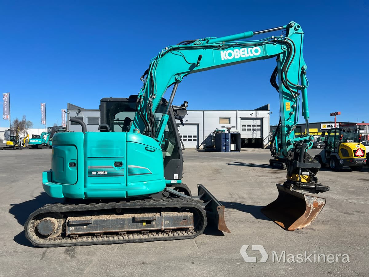 Grävmaskin Kobelco SK75SR-3E - Kettenbagger: das Bild 4 Grävmaskin Kobelco SK75SR-3E - Kettenbagger: das Bild 4