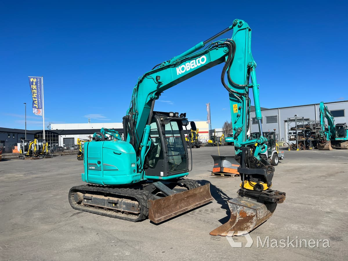 Grävmaskin Kobelco SK75SR-3E - Kettenbagger: das Bild 3 Grävmaskin Kobelco SK75SR-3E - Kettenbagger: das Bild 3