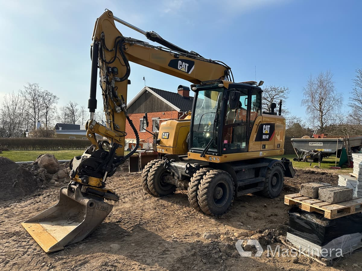 Hjulgrävare Cat M314F + redskap/vagn/grävsystem - Kettenbagger: das Bild 1 Hjulgrävare Cat M314F + redskap/vagn/grävsystem - Kettenbagger: das Bild 1