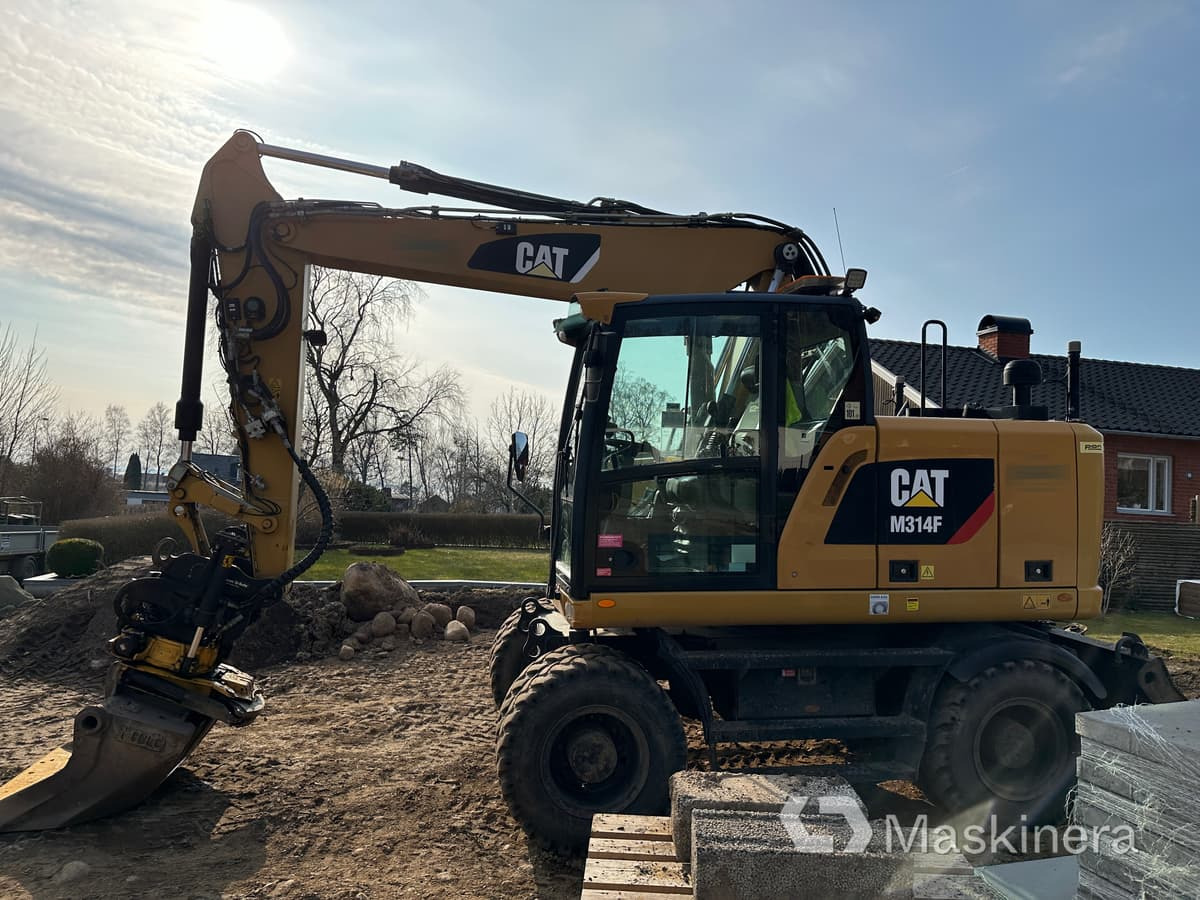 Hjulgrävare Cat M314F + redskap/vagn/grävsystem - Kettenbagger: das Bild 5 Hjulgrävare Cat M314F + redskap/vagn/grävsystem - Kettenbagger: das Bild 5