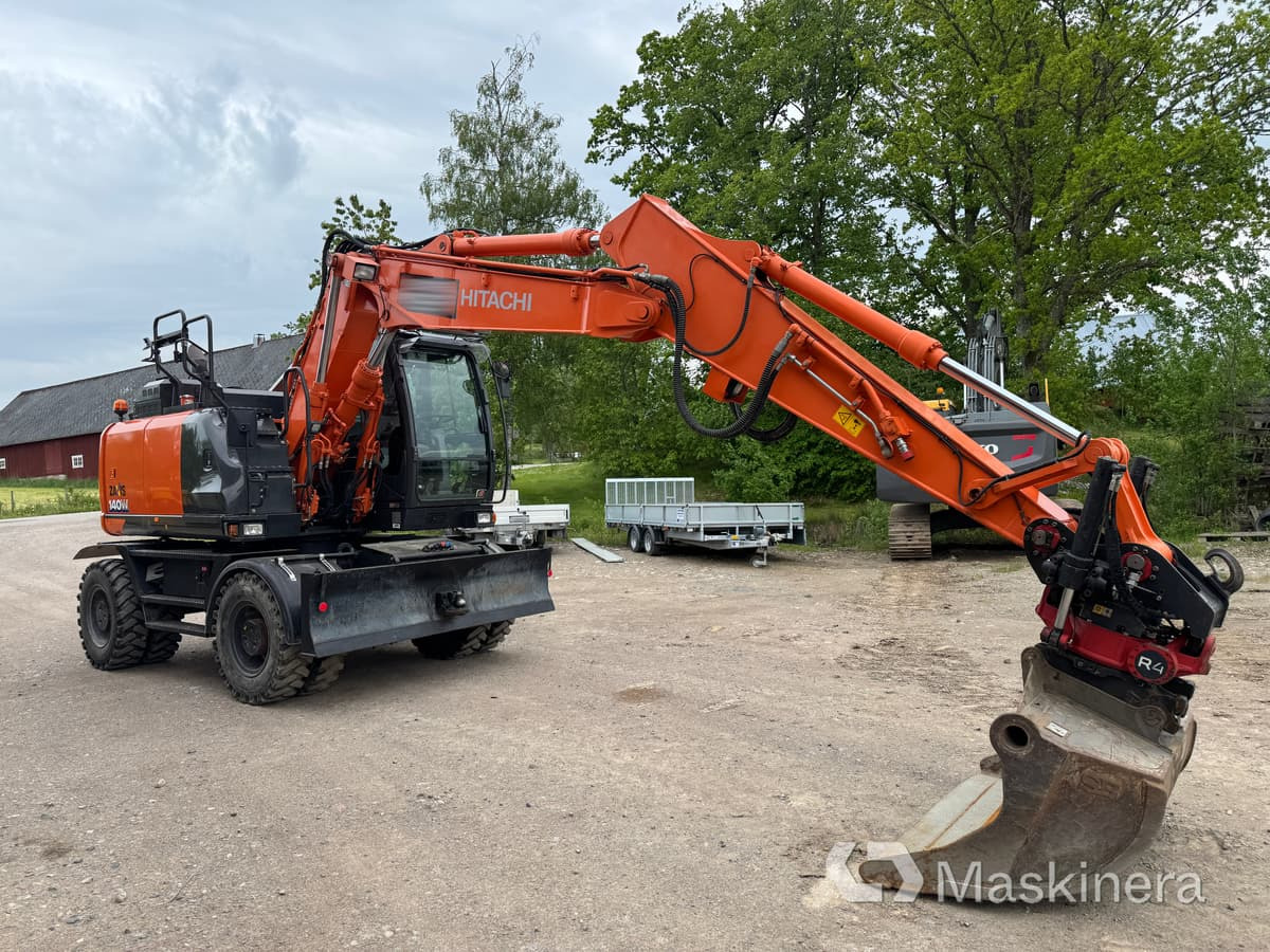 Hjulgrävare Hitachi Zaxis 140W med redskap - Kettenbagger: das Bild 3 Hjulgrävare Hitachi Zaxis 140W med redskap - Kettenbagger: das Bild 3
