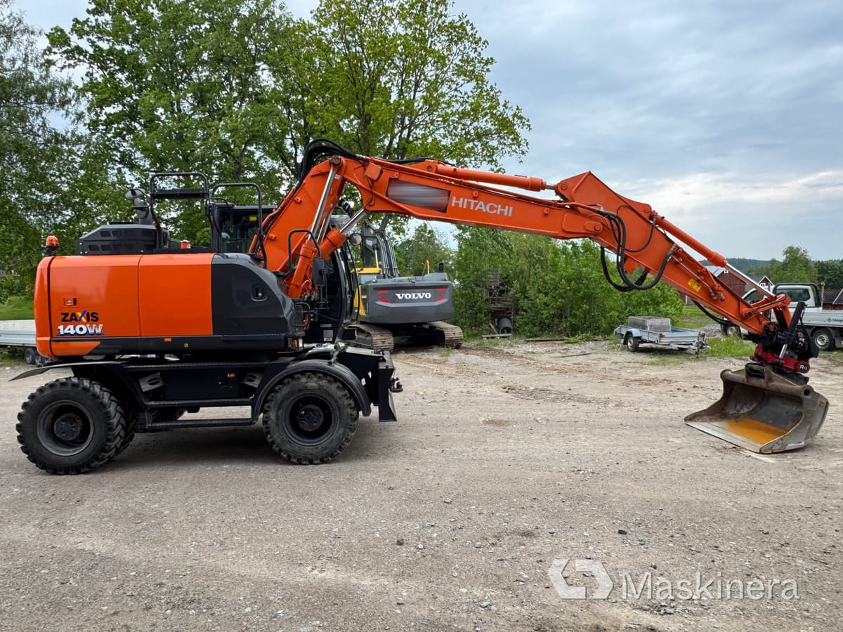 Hjulgrävare Hitachi Zaxis 140W med redskap - Kettenbagger: das Bild 4 Hjulgrävare Hitachi Zaxis 140W med redskap - Kettenbagger: das Bild 4