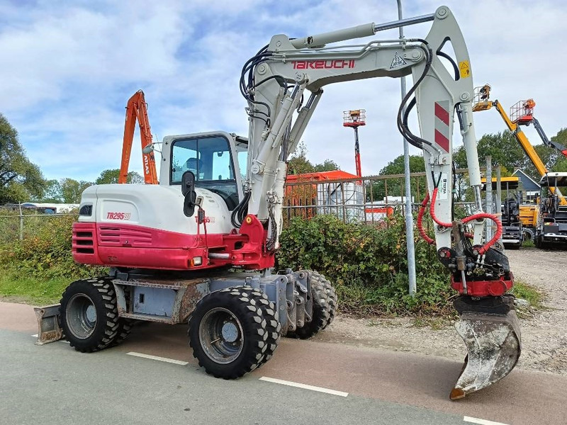 Mobilbagger Takeuchi TB 295 W mobiele graafmachine mobile excavator: das Bild 9