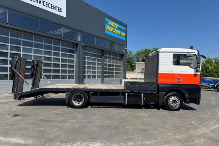 MAN TGA 18.413 4x2 BaggerTaxi - Autotransporter LKW: das Bild 4 MAN TGA 18.413 4x2 BaggerTaxi - Autotransporter LKW: das Bild 4