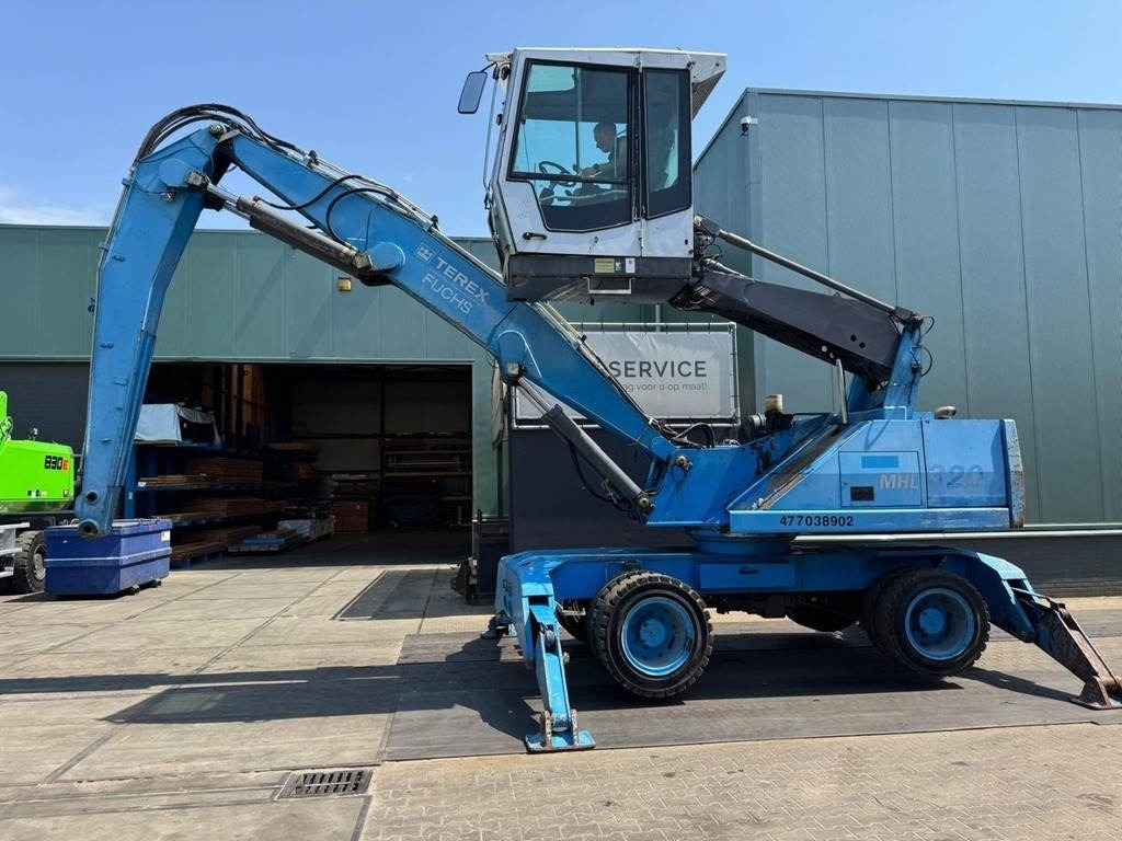 Fuchs MHL 320 - Umschlagbagger: das Bild 1 Fuchs MHL 320 - Umschlagbagger: das Bild 1