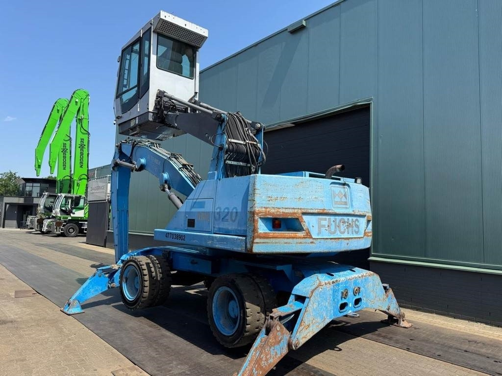 Fuchs MHL 320 - Umschlagbagger: das Bild 3 Fuchs MHL 320 - Umschlagbagger: das Bild 3