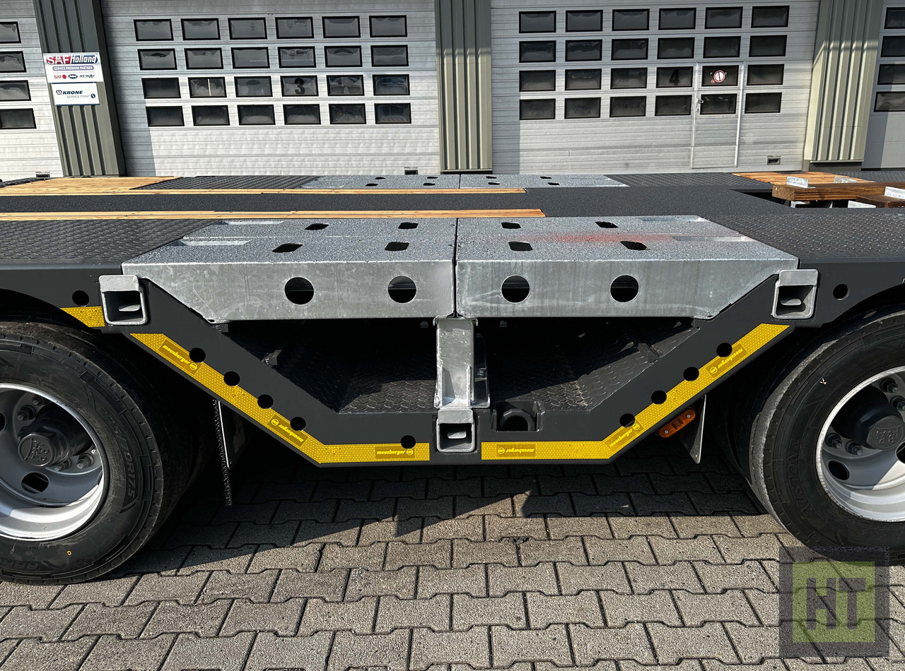 Tieflader Auflieger Meusburger 3-Achs-Tele-Semi mit 1 Paar Radmulden und hydr. Rampen: das Bild 8