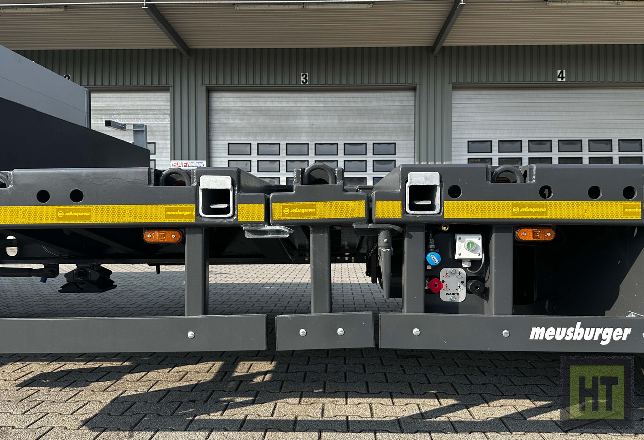 Tieflader Auflieger Meusburger 3-Achs-Tele-Semi mit 1 Paar Radmulden und hydr. Rampen: das Bild 6
