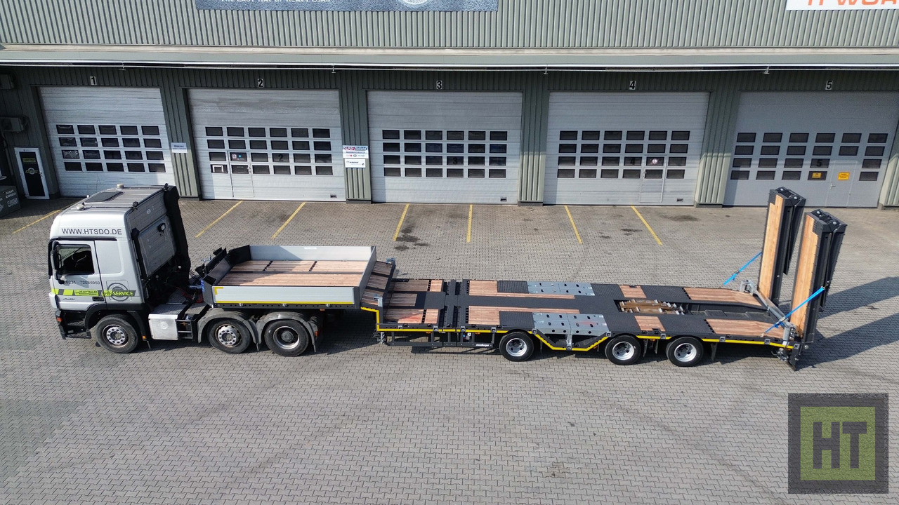 Meusburger 3-Achs-Tele-Semi mit 1 Paar Radmulden und hydr. Rampen - Tieflader Auflieger: das Bild 3 Meusburger 3-Achs-Tele-Semi mit 1 Paar Radmulden und hydr. Rampen - Tieflader Auflieger: das Bild 3