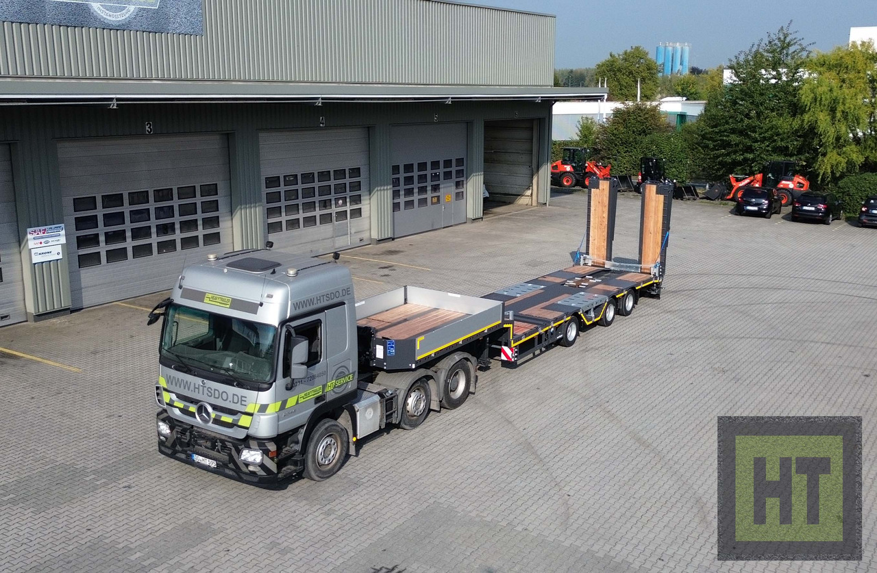 Tieflader Auflieger Meusburger 3-Achs-Tele-Semi mit 1 Paar Radmulden und hydr. Rampen: das Bild 12