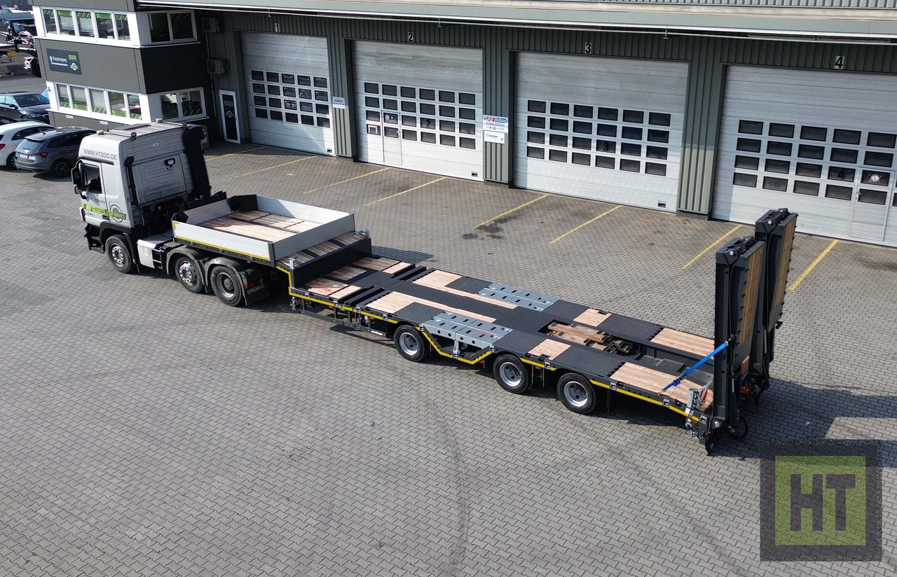 Tieflader Auflieger Meusburger 3-Achs-Tele-Semi mit 1 Paar Radmulden und hydr. Rampen: das Bild 11