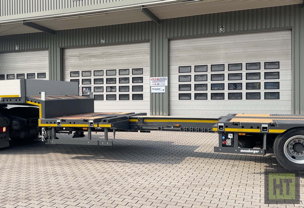 Meusburger 3-Achs-Tele-Semi mit 1 Paar Radmulden und hydr. Rampen - Tieflader Auflieger: das Bild 4 Meusburger 3-Achs-Tele-Semi mit 1 Paar Radmulden und hydr. Rampen - Tieflader Auflieger: das Bild 4