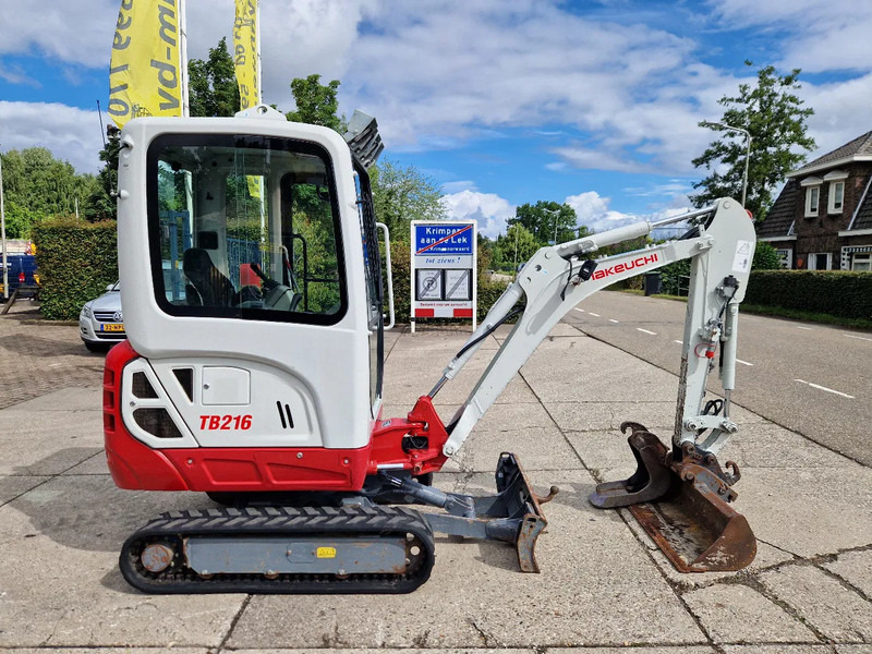 Minibagger Takeuchi TB216 met 2089 uur: das Bild 18