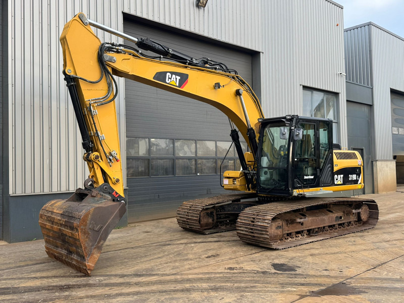 Caterpillar 319DL - Kettenbagger: das Bild 2 Caterpillar 319DL - Kettenbagger: das Bild 2