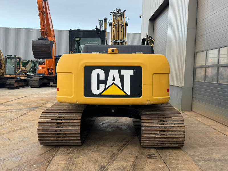 Caterpillar 319DL - Kettenbagger: das Bild 4 Caterpillar 319DL - Kettenbagger: das Bild 4