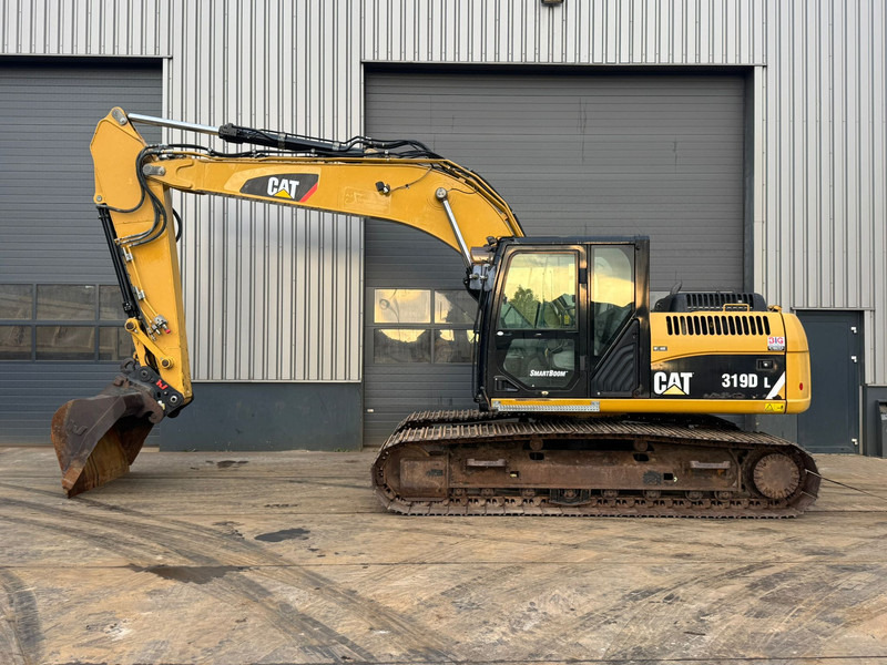 Caterpillar 319DL - Kettenbagger: das Bild 1 Caterpillar 319DL - Kettenbagger: das Bild 1