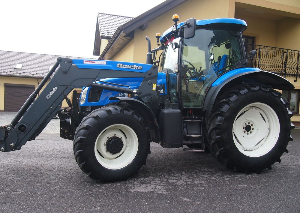 Ciągnik New Holland NH TS125A 6 cylindrów 2004 Ciągnik rolniczy New Holland TS125A - Traktor: das Bild 3 Ciągnik New Holland NH TS125A 6 cylindrów 2004 Ciągnik rolniczy New Holland TS125A - Traktor: das Bild 3