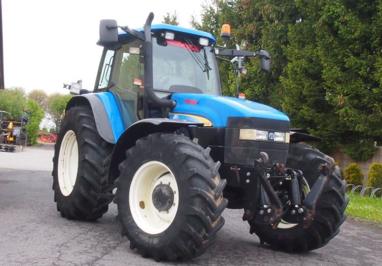 Ciągnik New Holland TM 140 2004 Przedni TUZ - Traktor: das Bild 2 Ciągnik New Holland TM 140 2004 Przedni TUZ - Traktor: das Bild 2