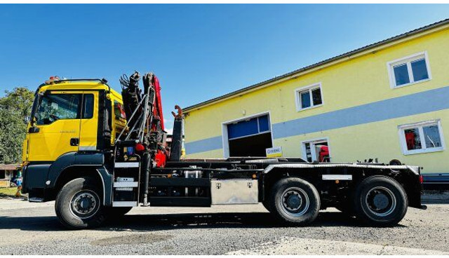 MAN TGS 33.440 - Abrollkipper, Autokran: das Bild 2 MAN TGS 33.440 - Abrollkipper, Autokran: das Bild 2
