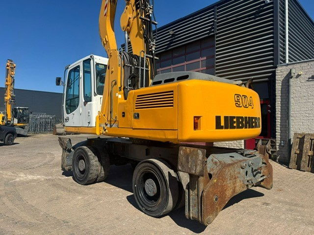 Liebherr A 904 C Litronic + Grab - Umschlagbagger: das Bild 2 Liebherr A 904 C Litronic + Grab - Umschlagbagger: das Bild 2