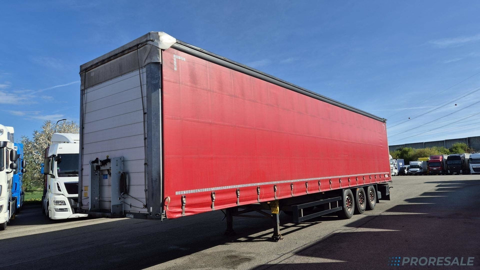 SCHMITZ CARGOBULL SCS 24/L - 13.62 EB Std. - Planenauflieger: das Bild 2 SCHMITZ CARGOBULL SCS 24/L - 13.62 EB Std. - Planenauflieger: das Bild 2