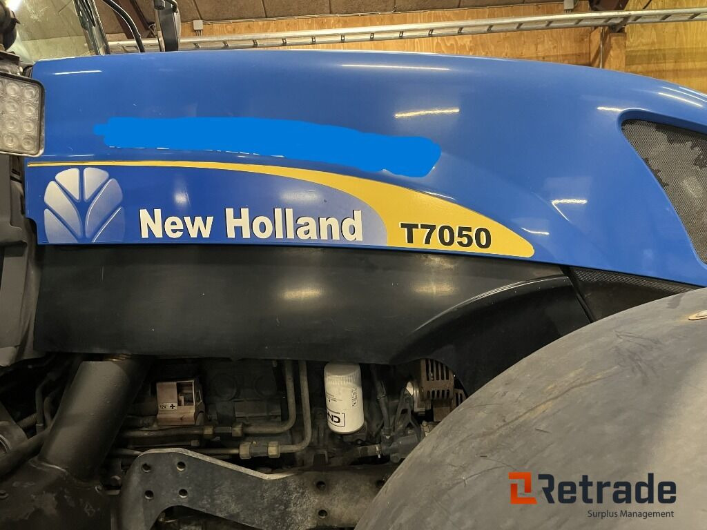 Traktor NEW HOLLAND T7050 - Landmaschine: das Bild 5 Traktor NEW HOLLAND T7050 - Landmaschine: das Bild 5