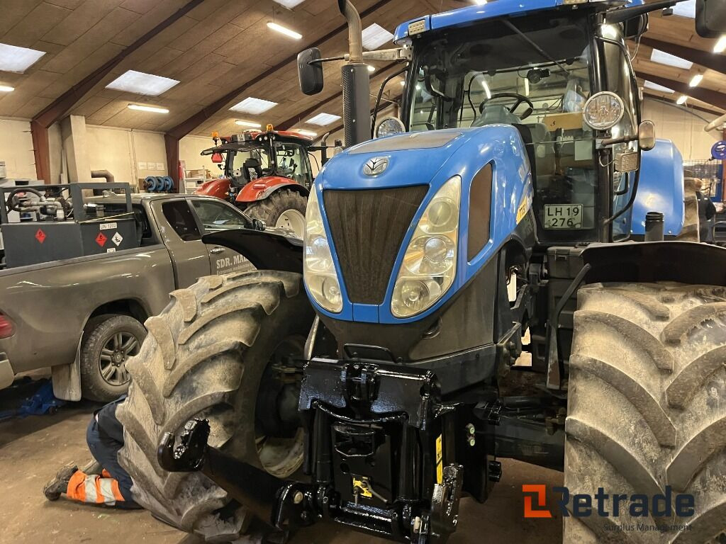 Traktor NEW HOLLAND T7050 - Landmaschine: das Bild 3 Traktor NEW HOLLAND T7050 - Landmaschine: das Bild 3