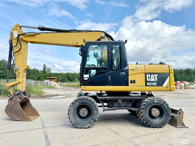 Cat M315D - Triple Boom / Quick Coupler - Mobilbagger: das Bild 1 Cat M315D - Triple Boom / Quick Coupler - Mobilbagger: das Bild 1