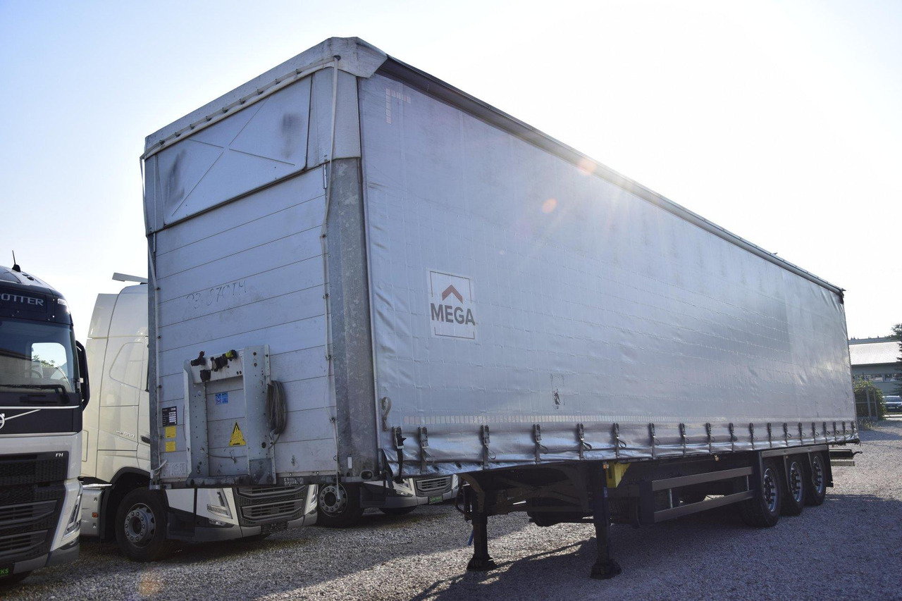 Schmitz Cargobull SCS24/L Varios - Planenauflieger: das Bild 1 Schmitz Cargobull SCS24/L Varios - Planenauflieger: das Bild 1