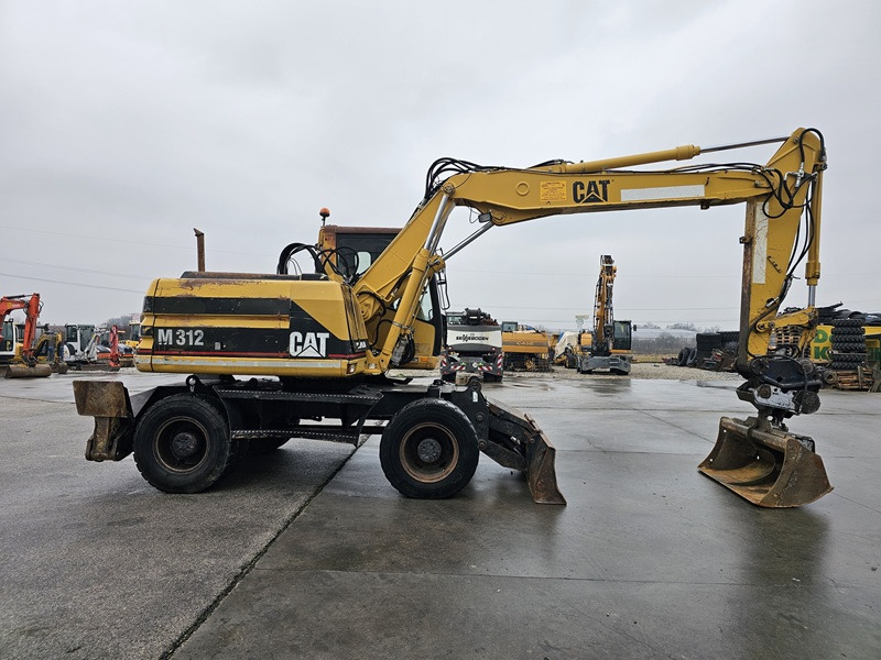 CATERPILLAR M312D - Mobilbagger: das Bild 4 CATERPILLAR M312D - Mobilbagger: das Bild 4