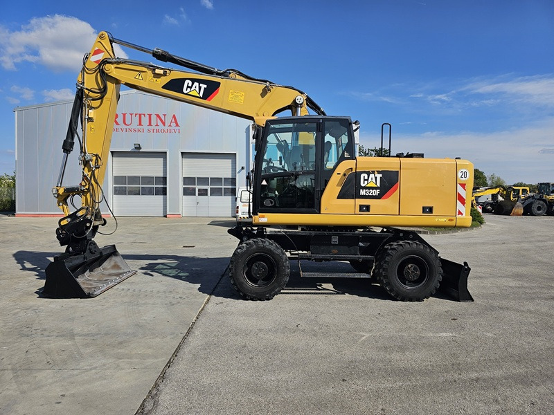 CATERPILLAR M320F - Mobilbagger: das Bild 1 CATERPILLAR M320F - Mobilbagger: das Bild 1