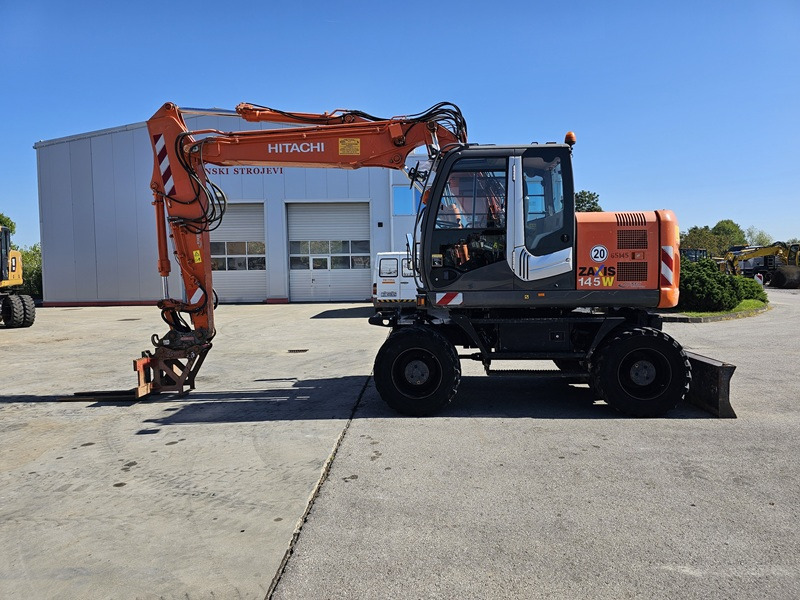 HITACHI ZX145W-3 - Mobilbagger: das Bild 1 HITACHI ZX145W-3 - Mobilbagger: das Bild 1