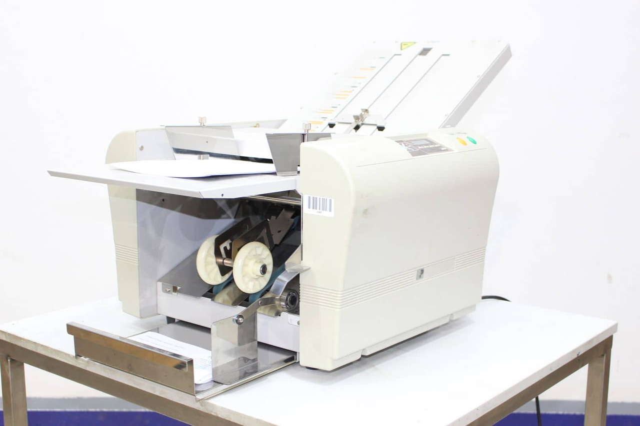 Hefter TF Master M - Falzmaschine: das Bild 3 Hefter TF Master M - Falzmaschine: das Bild 3