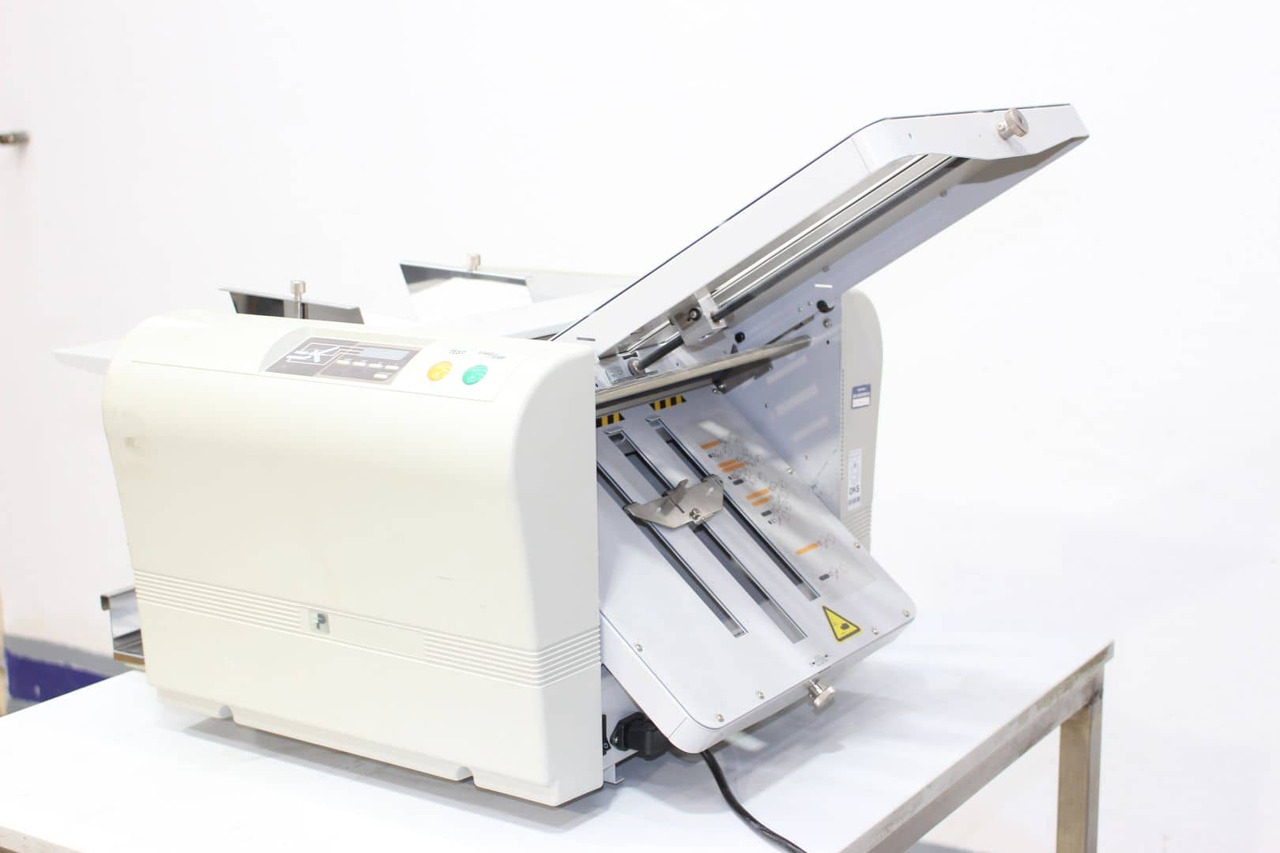 Hefter TF Master M - Falzmaschine: das Bild 2 Hefter TF Master M - Falzmaschine: das Bild 2