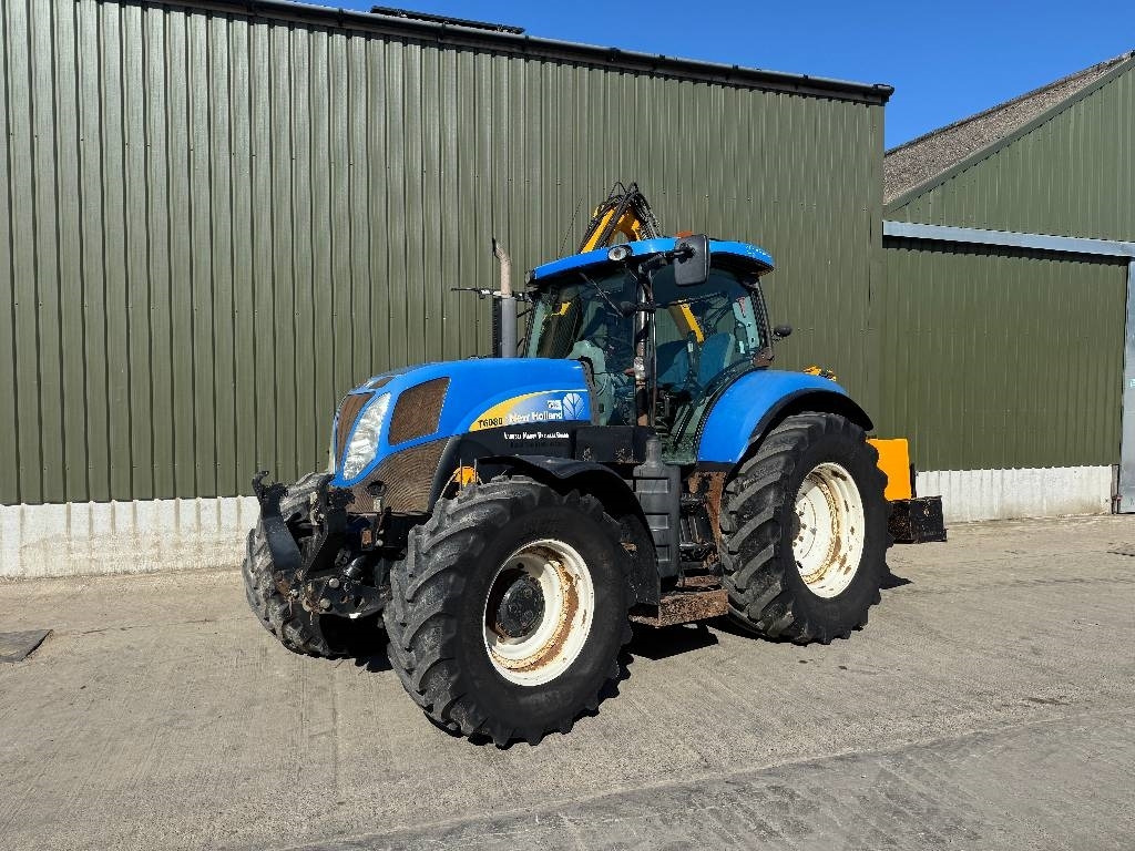 New Holland T6080 c/w Herder Cavalier - Schlegelmäher/ Mulcher: das Bild 1 New Holland T6080 c/w Herder Cavalier - Schlegelmäher/ Mulcher: das Bild 1