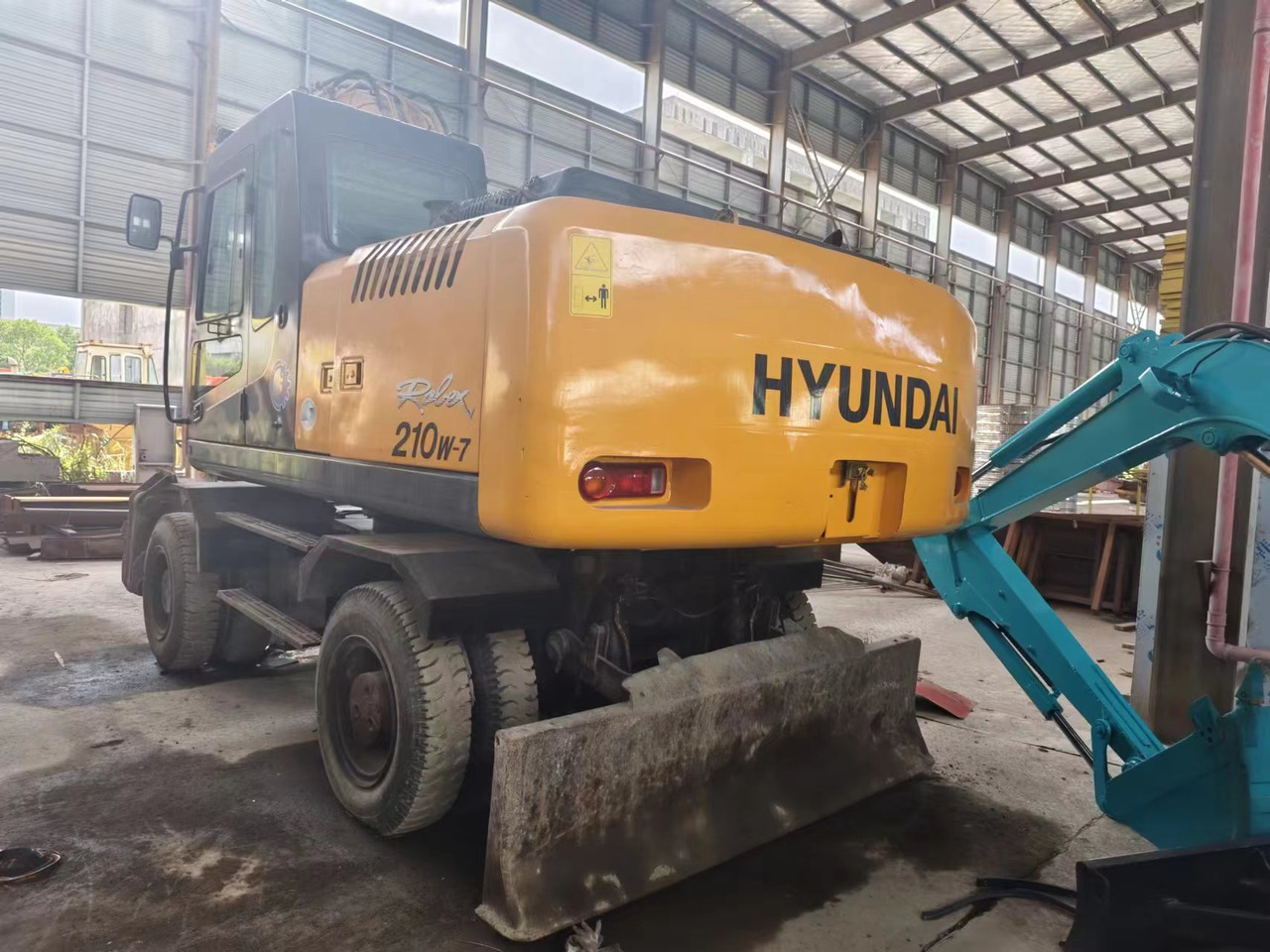 HYUNDAI 210W-7 - Mobilbagger: das Bild 4 HYUNDAI 210W-7 - Mobilbagger: das Bild 4