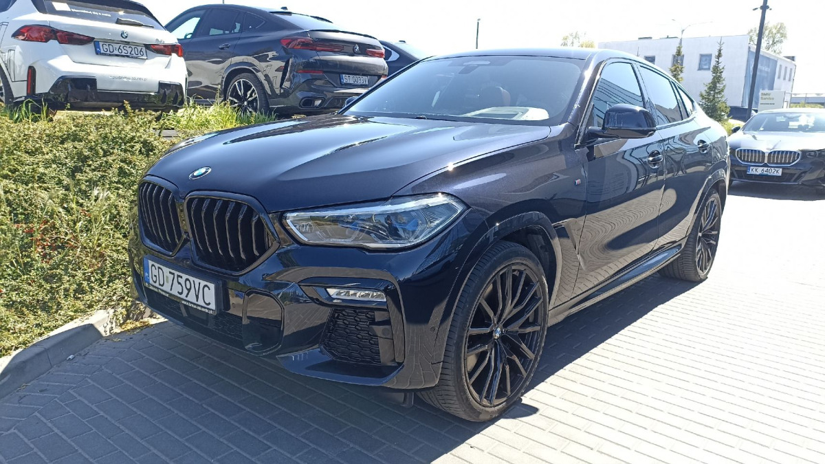 BMW X6 M50i SUV - SUV/ Geländewagen: das Bild 2 BMW X6 M50i SUV - SUV/ Geländewagen: das Bild 2