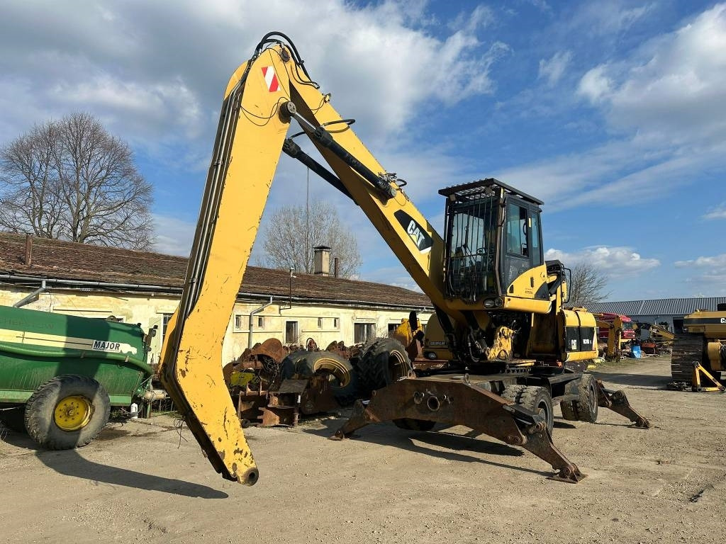 CAT M 318 D MH - Umschlagbagger: das Bild 1 CAT M 318 D MH - Umschlagbagger: das Bild 1