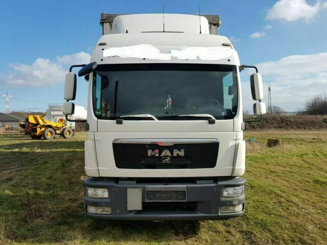 MAN TGL8.240 G.Haus/2xBett Klima AHK - Planen Transporter: das Bild 1 MAN TGL8.240 G.Haus/2xBett Klima AHK - Planen Transporter: das Bild 1