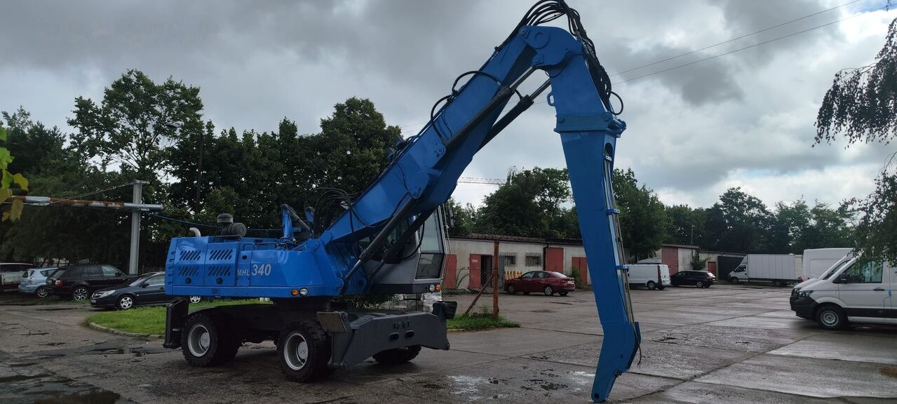 Fuchs MHL 340 D FQC magnet generator - Umschlagbagger: das Bild 5 Fuchs MHL 340 D FQC magnet generator - Umschlagbagger: das Bild 5