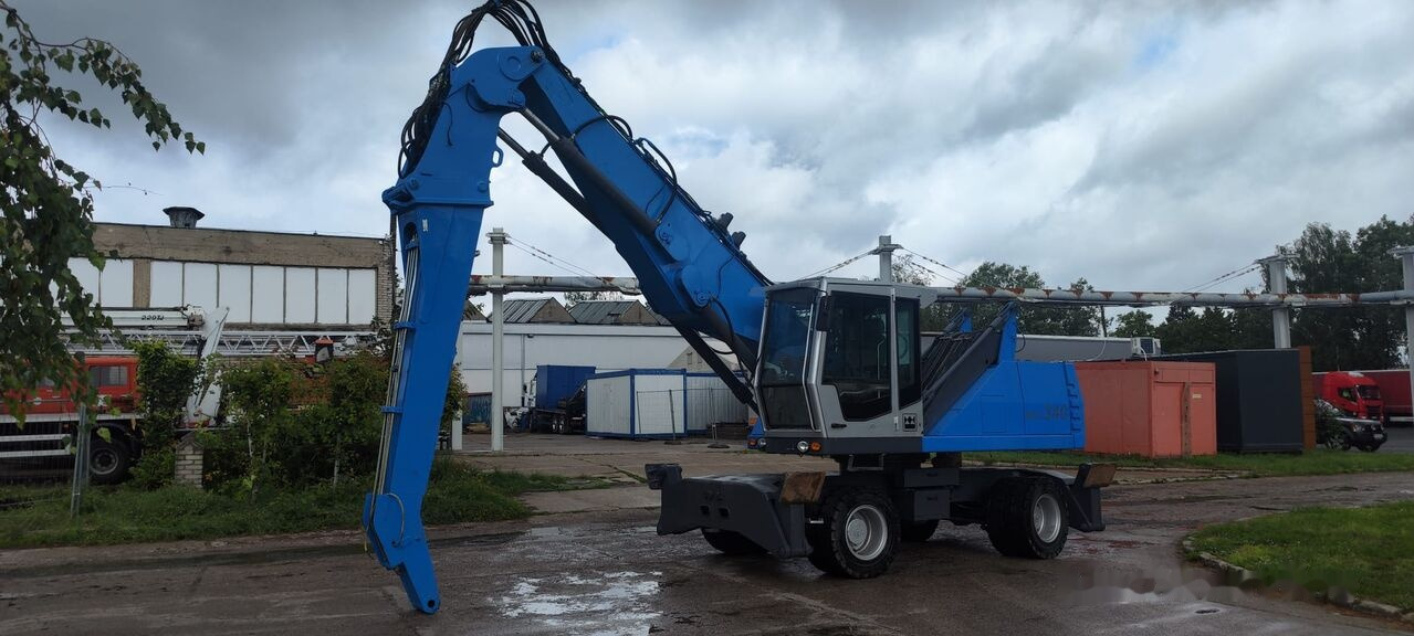 Fuchs MHL 340 D FQC magnet generator - Umschlagbagger: das Bild 2 Fuchs MHL 340 D FQC magnet generator - Umschlagbagger: das Bild 2