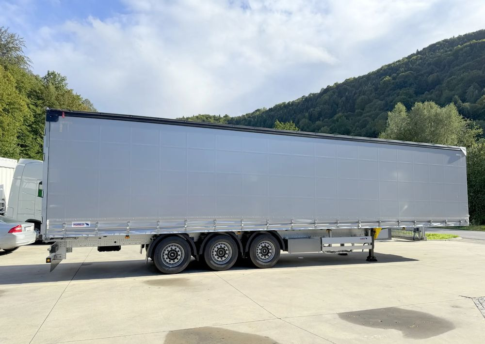 Schmitz Cargobull VARIOS + SKRZYNKA - Planenauflieger: das Bild 3 Schmitz Cargobull VARIOS + SKRZYNKA - Planenauflieger: das Bild 3
