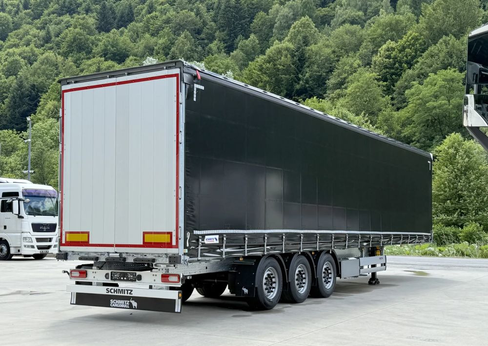 Schmitz Cargobull VARIOS + SKRZYNKA - Planenauflieger: das Bild 2 Schmitz Cargobull VARIOS + SKRZYNKA - Planenauflieger: das Bild 2