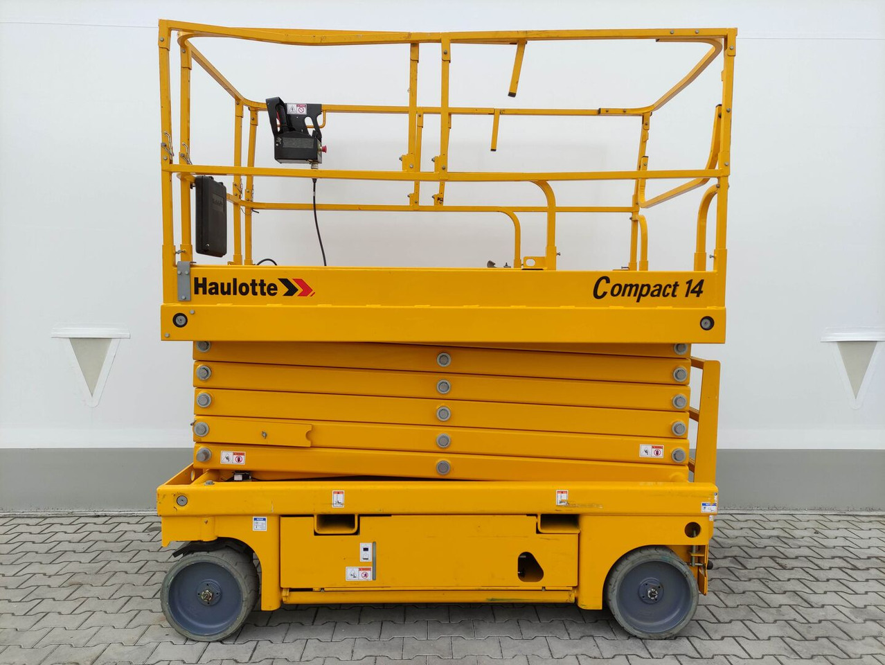 Haulotte Compact14 - Scherenbühne: das Bild 1 Haulotte Compact14 - Scherenbühne: das Bild 1