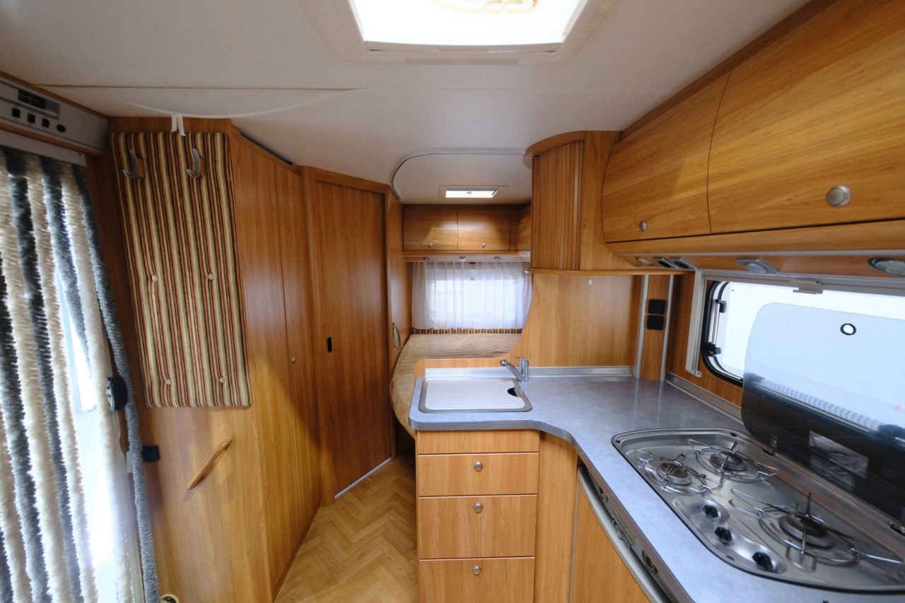 Teilintegriertes Wohnmobil Bürstner T 580 Marano/Festbett/Solar/Markise/nur 5,99 m: das Bild 12