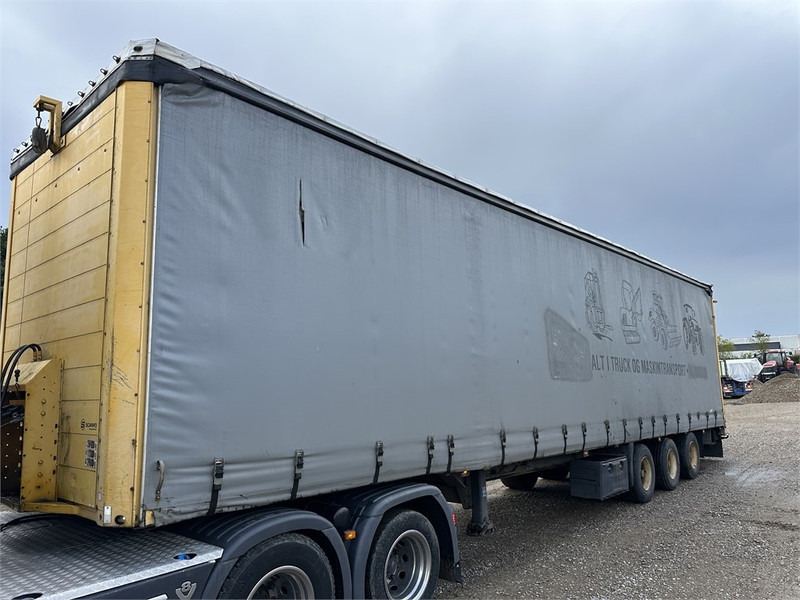 Schmitz Cargobull Machine transport trailer with bag ramp - Tieflader Auflieger: das Bild 4 Schmitz Cargobull Machine transport trailer with bag ramp - Tieflader Auflieger: das Bild 4