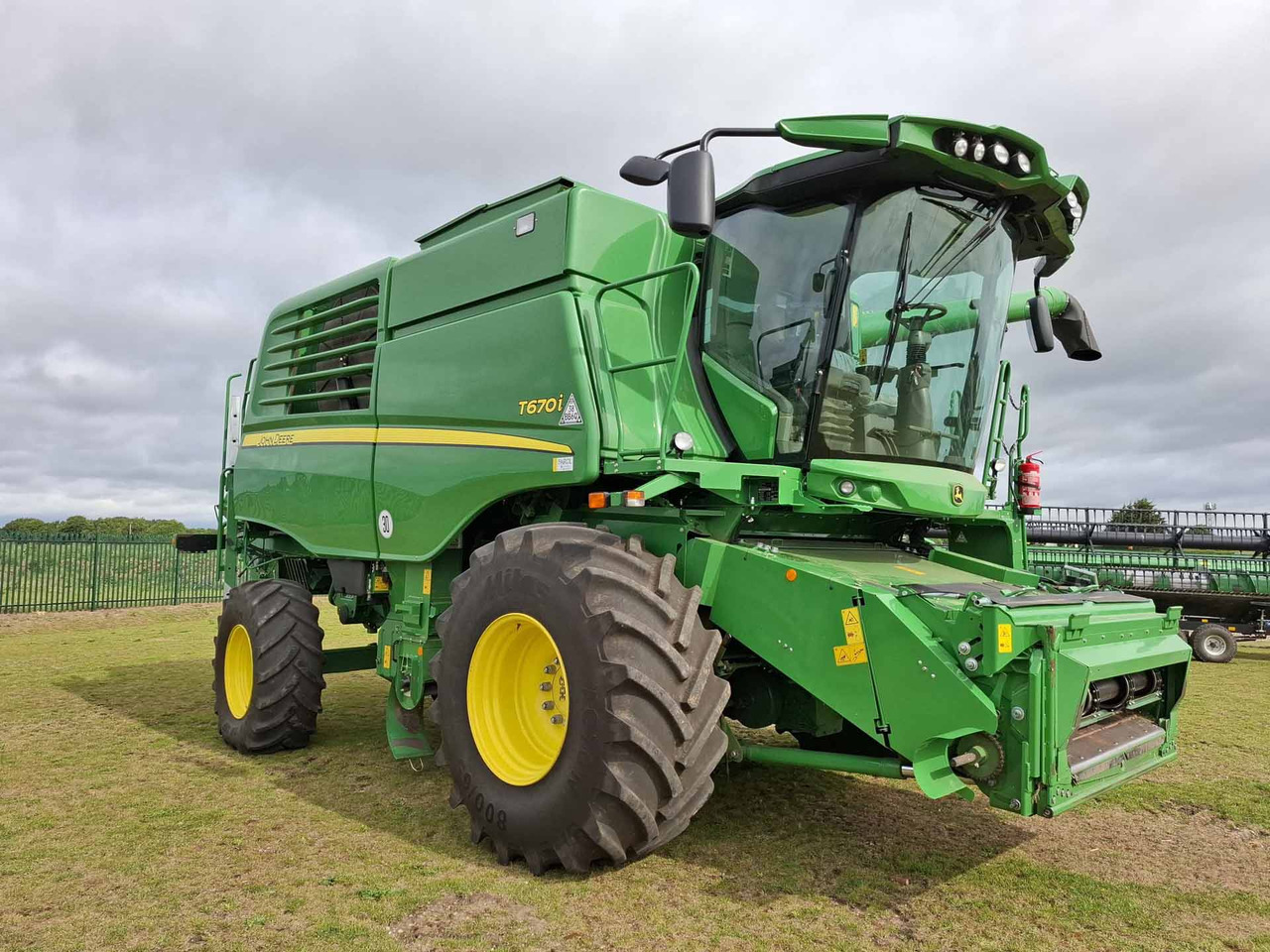 John Deere T670 - Mähdrescher: das Bild 1 John Deere T670 - Mähdrescher: das Bild 1