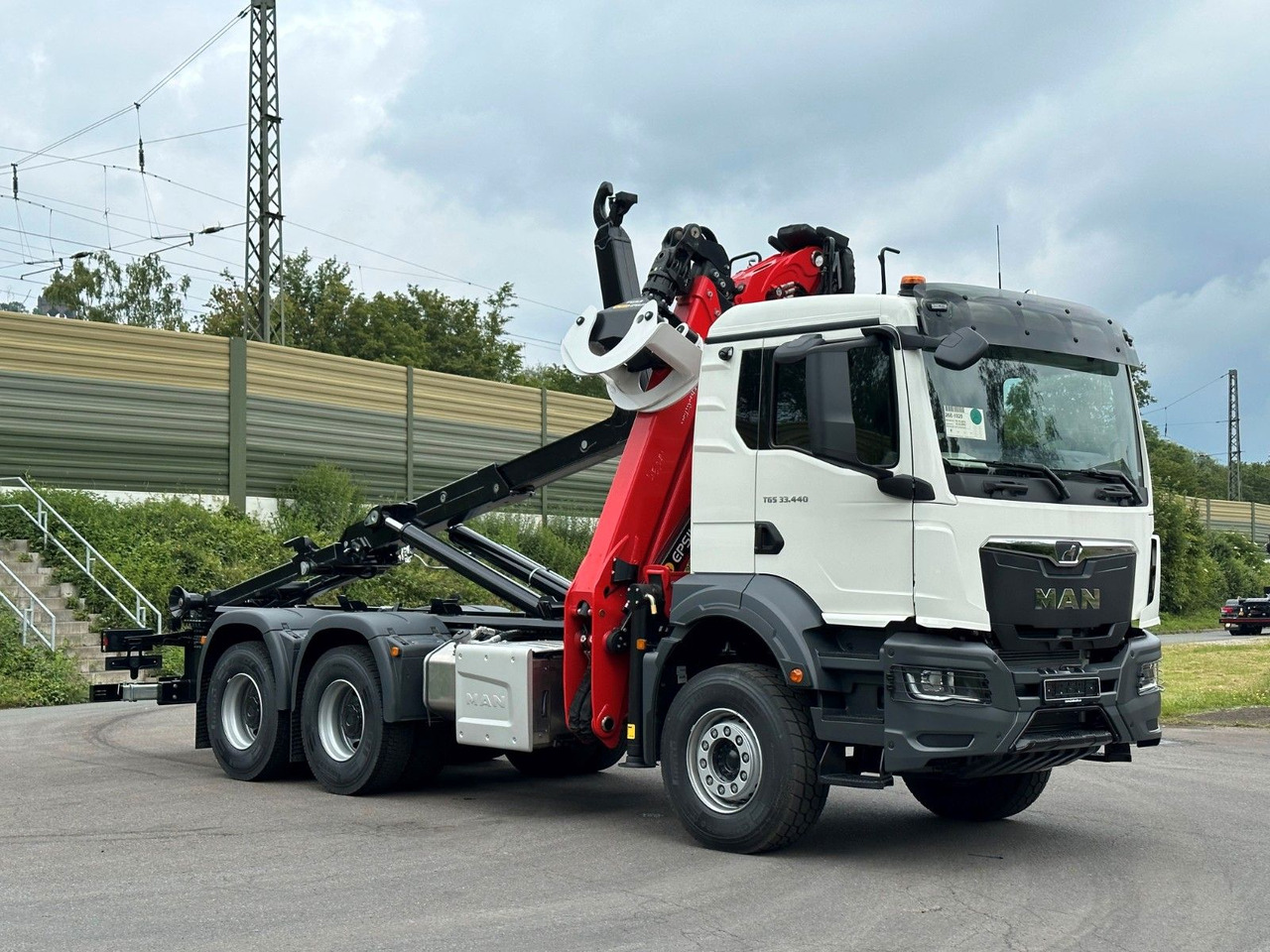 MAN TGS 33.440 6x4 Epsilon 170Z MultiLift 20s56 - Abrollkipper, Autokran: das Bild 1 MAN TGS 33.440 6x4 Epsilon 170Z MultiLift 20s56 - Abrollkipper, Autokran: das Bild 1