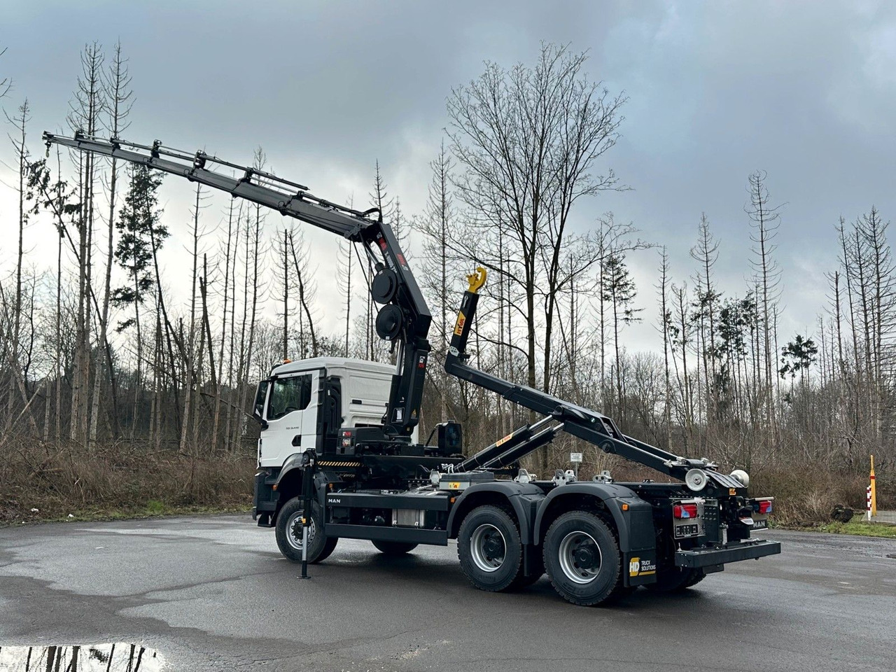 MAN TGS 33.440 6x6 BB Abrollkipper+Kran Hiab 228-6 - Abrollkipper, Autokran: das Bild 5 MAN TGS 33.440 6x6 BB Abrollkipper+Kran Hiab 228-6 - Abrollkipper, Autokran: das Bild 5